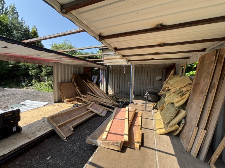 Interior of the Slice of Hope containers during construction, insulation stacked