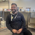 Tradesperson in the pizza kitchen during Slice of Hope fit-out
